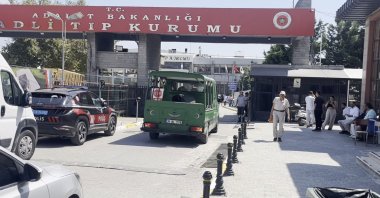 The body of former Transport Minister Arif Ahmet Denizolgun is brought to the Council of Forensic Medicine for examination, Istanbul, Türkiye, Aug. 19, 2026. (DHA Photo)