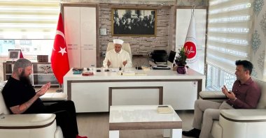 Hungarian tourist Petrin Kornel (L), who embraced Islam and took the name Abbas, attends a conversion ceremony, Manavgat, Antalya, Türkiye, Aug. 26, 2026. (IHA Photo)