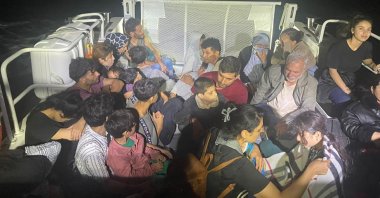 Illegal migrants are detained during a raid off Çanakkale, western Türkiye, Aug. 26, 2026. (AA Photo)