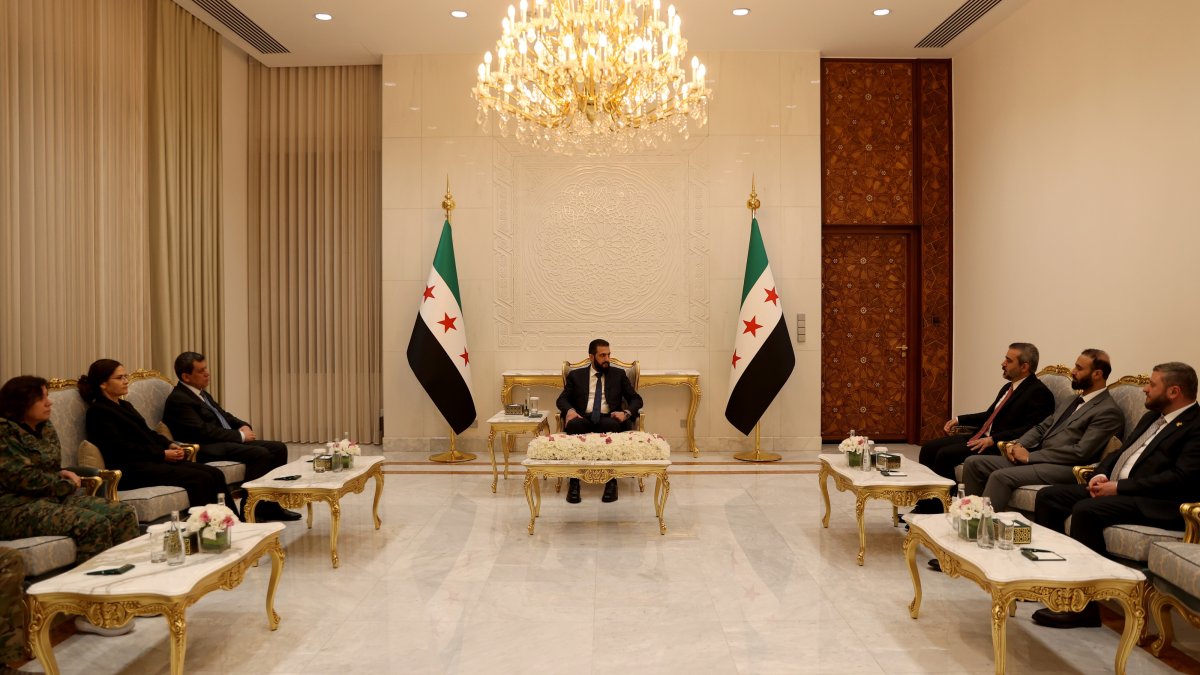 Syrian President Ahmed al-Sharaa (C) receives Ferhat Abdi Şahin (3rd L), one of the ringleaders of the YPG group, Damascus, Syria, Aug. 25, 2026. (AA Photo)