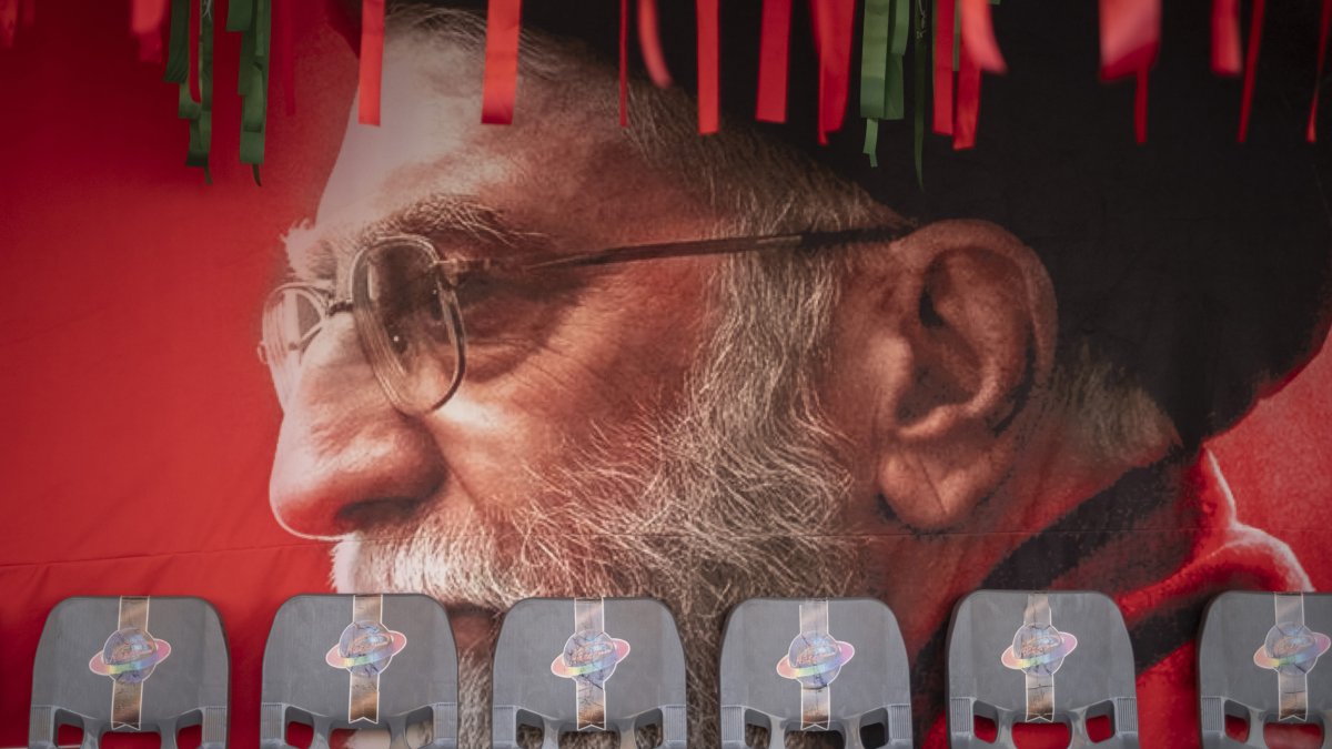 A banner depicting a portrait of Iran's late Supreme Leader Ayatollah Ali Khamenei is seen in downtown Tehran, Iran, Aug. 23, 2026. (Getty Images Photo)