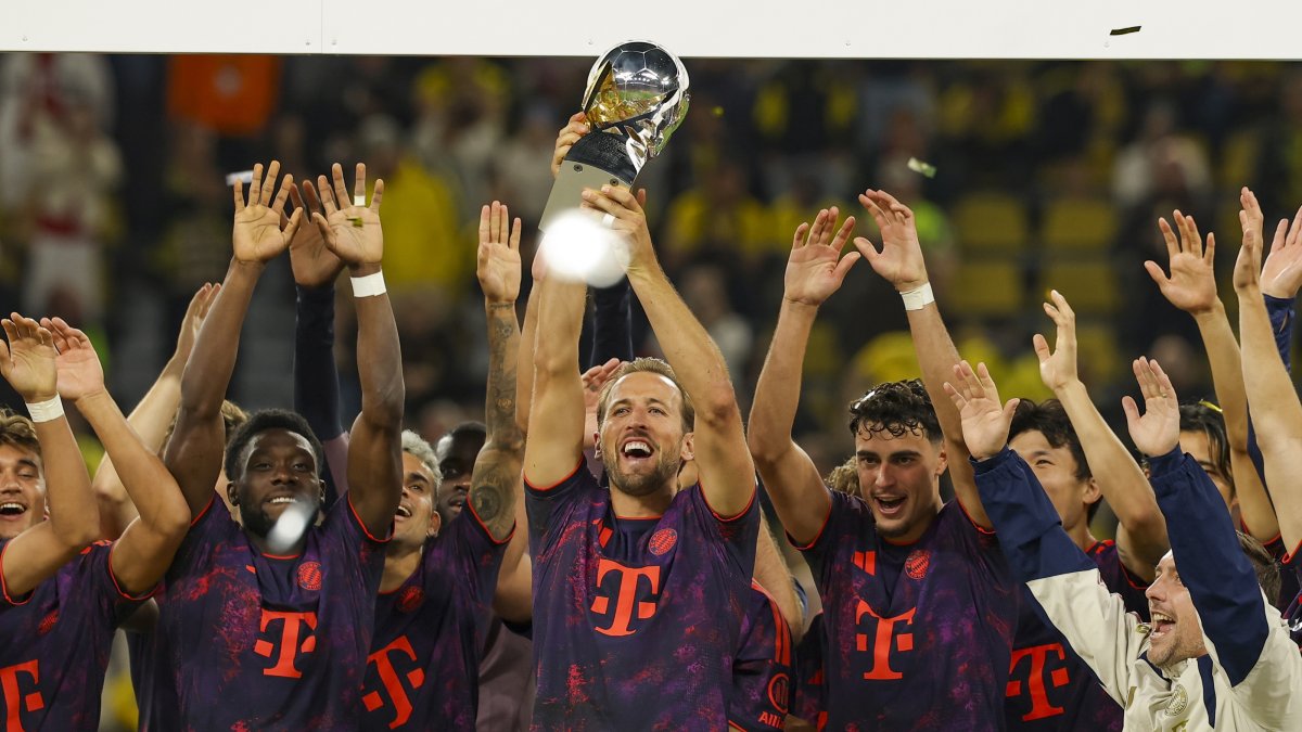 Bayern Munich players celebrate winning the German Supercup against Borussia Dortmund, in Dortmund, Germany, Aug. 22, 2026. (EPA Photo)