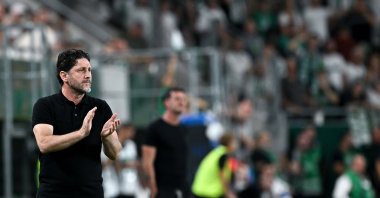 Head coach of Trabzonspor Fatih Tekke watches from the touchline during the UEFA Europa League play-offs second-leg match between Ferencvaros and Trabzonspor, Budapest, Hungary, Aug. 27, 2026. (EPA Photo)