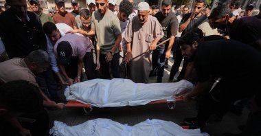 Palestinians mourn over the bodies of their relatives killed in an Israeli army strike during their funeral at Shifa Hospital, Gaza City, Palestine, Aug. 26, 2026. (AP Photo)