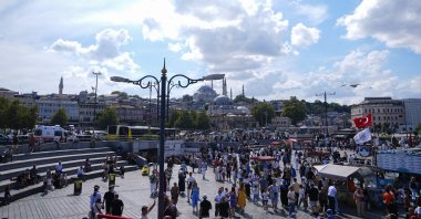 People are seen in the historic Eminönü district in Istanbul, Türkiye, Aug. 16, 2026. (AA Photo)