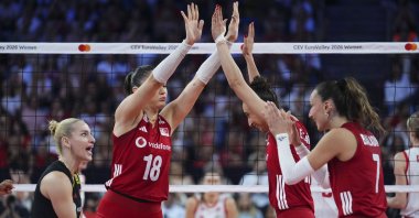 Türkiye’s Zehra Güneş (18) and Elif Şahin (12) celebrate during the CEV Women’s European Volleyball Championship Group A match against Poland at Sinan Erdem Sports Hall in Istanbul, Türkiye, Aug. 28, 2026. (AA Photo)