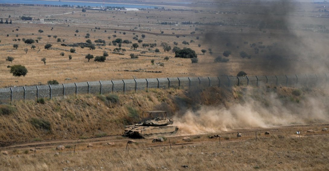 An Israeli tank drives along the cease-fire line between the Israeli-occupied Golan Heights and Syria, Aug. 20, 2026. (Reuters File Photo)