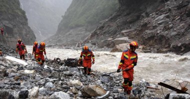 Fire and rescue personnel conduct search-and-rescue operations 2 kilometers from Gyirong Port, days after the Aug. 26 mudslide that destroyed the port, in Gyirong County, Tibet, China, Aug. 29, 2026. (AFP Photo)