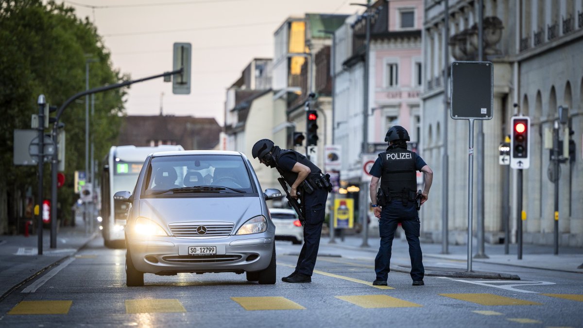 Police officers patrol a street in downtown Aarau, Switzerland, Aug. 30, 2026. (EPA Photo)