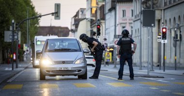 Police officers patrol a street in downtown Aarau, Switzerland, Aug. 30, 2026. (EPA Photo)