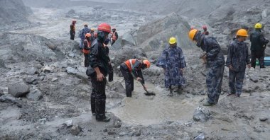 Rescue workers take part in a rescue operation near the tunnel of the Trishuli 3A Hydropower Project, following deadly flash floods and mudslides, in Rasuwa, Nepal, Aug. 30, 2026. (Reuters Photo)