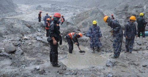 Rescue workers take part in a rescue operation near the tunnel of the Trishuli 3A Hydropower Project, following deadly flash floods and mudslides, in Rasuwa, Nepal, Aug. 30, 2026. (Reuters Photo)