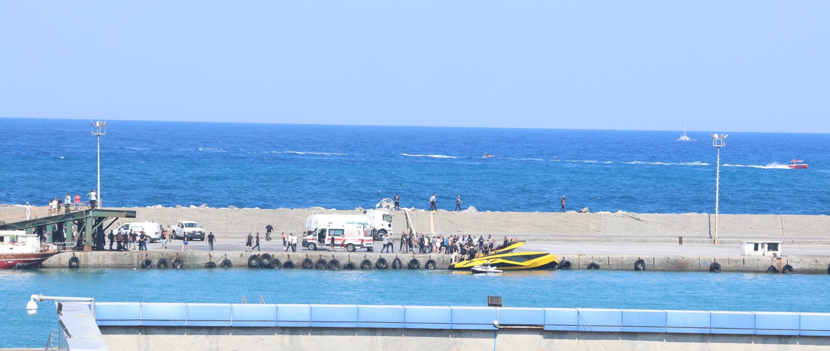 Ambulances and emergency teams stand by near the Port of Girne following a ferry accident, Girne (Kyrenia), TRNC, Aug. 30, 2026. (AA Photo)