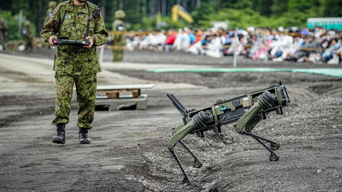 A Japan Ground Self-Defense Force (JGSDF) soldier operates a quadruped unmanned ground vehicle during a live-fire exercise at the East Fuji Maneuver Area, Gotemba, Japan, June 7, 2026. (AFP Photo)
