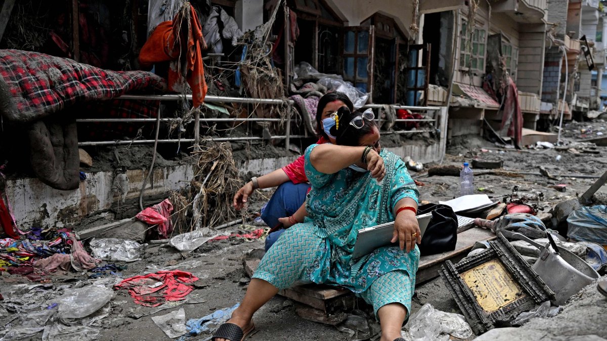 People salvage belongings from their home following flash floods, Devighat, Nuwakot district, Nepal, Aug. 31, 2026. (AFP Photo)
