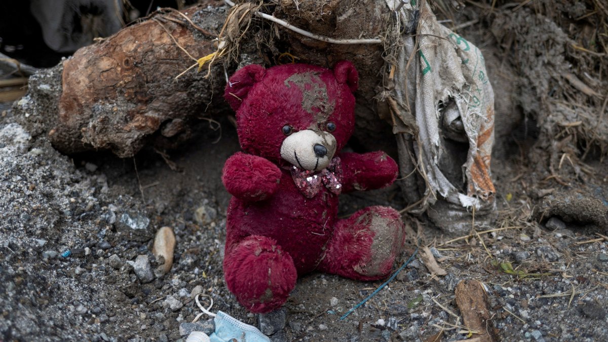 A stuffed toy lies amid debris and mud on the ground outside a damaged house following the flash floods and a mudslide, in Devighat, Nuwakot district, Nepal, Aug. 30, 2026. (Reuters Photo)