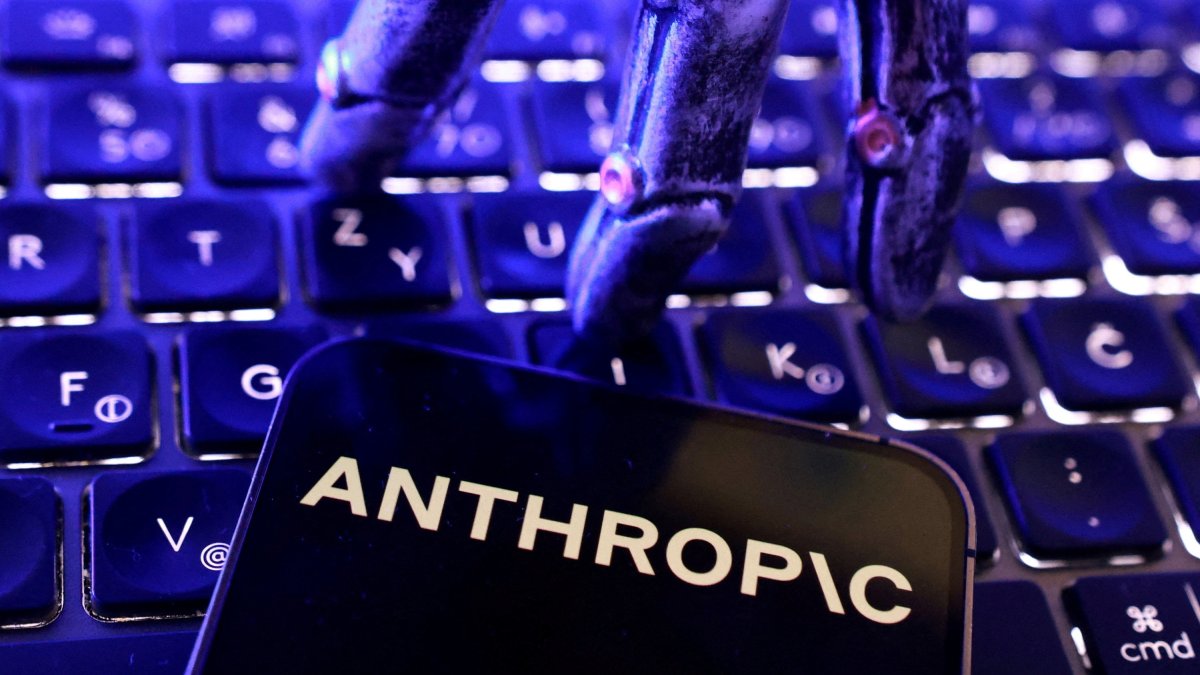 Anthropic logo, a keyboard and a robotic hand in this illustration taken June 5, 2026. (Reuters Photo)