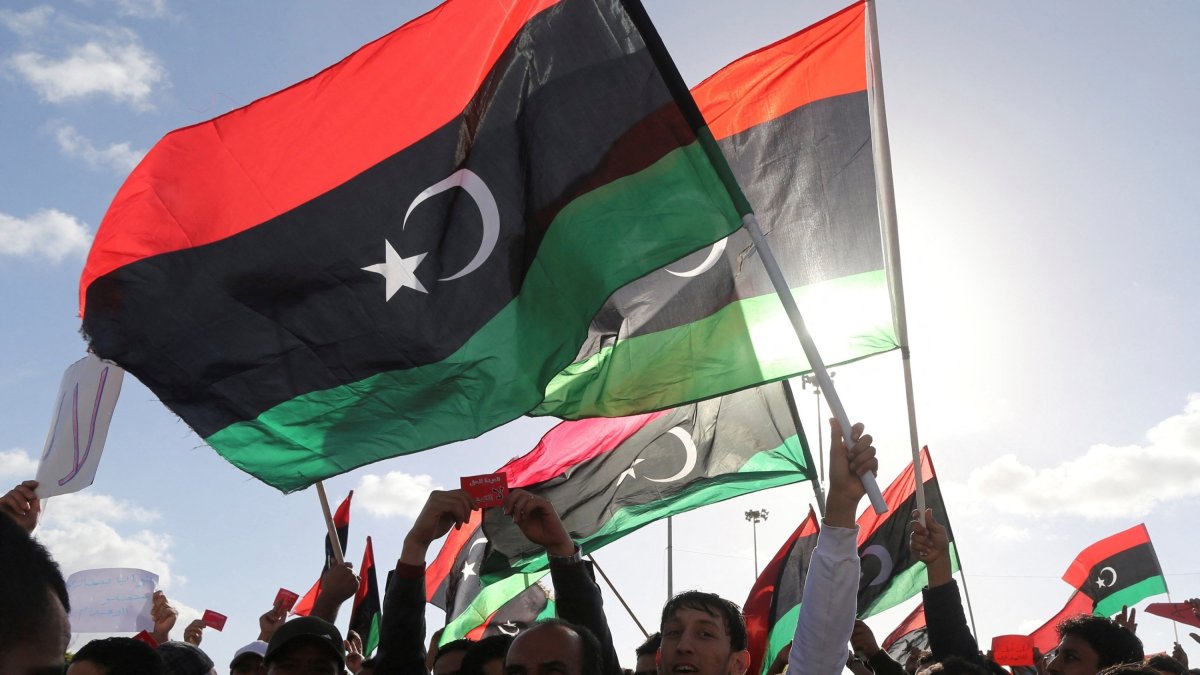 People wave Libyan flags during a demonstration in Benghazi, Libya, Feb. 7, 2014. (Reuters File Photo)