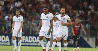 Inter's Hakan Çalhanoğlu (R) celebrates after scoring during a Italian Serie A match against Cagliari Calcio, in Cagliari, Italy, Aug. 30, 2026. (EPA Photo)