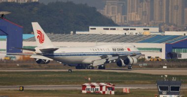 An Air China flight lands at Gimhae International Airport, Busan, South Korea, Oct. 30, 2025. (Reuters Photo)