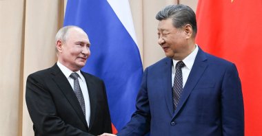 Russian President Vladimir Putin and Chinese President Xi Jinping shake hands as they pose for photos before a meeting on the sidelines of the Shanghai Cooperation Organization (SCO) summit in Bishkek, Kyrgyzstan, Aug. 31, 2026. (EPA Photo)