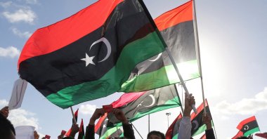 People wave Libyan flags during a demonstration in Benghazi, Libya, Feb. 7, 2014. (Reuters File Photo)