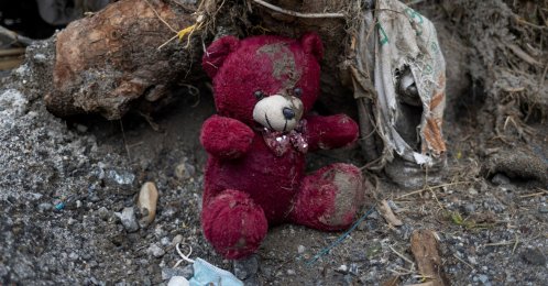 A stuffed toy lies amid debris and mud on the ground outside a damaged house following the flash floods and a mudslide, in Devighat, Nuwakot district, Nepal, Aug. 30, 2026. (Reuters Photo)