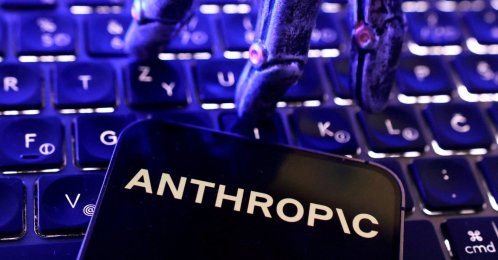 Anthropic logo, a keyboard and a robotic hand in this illustration taken June 5, 2026. (Reuters Photo)
