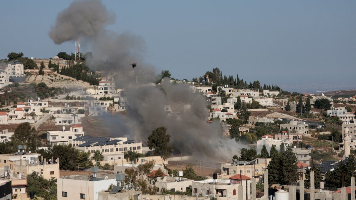 Smoke rises as Israeli forces blow up the house of a Palestinian family near Nablus, in the Israeli-occupied West Bank, Aug. 11, 2026. (Reuters File Photo)