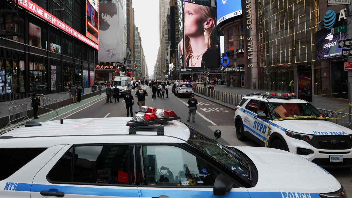Members of the NYPD stand guard at the scene of an officer-involved shooting in Times Square, New York City, U.S., Aug. 31, 2026. (Reuters Photo)