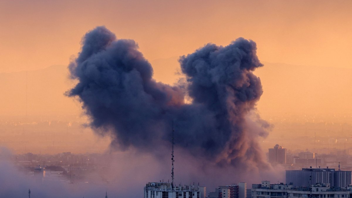 A plume of smoke rises after a strike on the Iranian capital Tehran, March 3, 2026. (AFP File Photo)