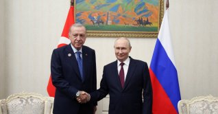 President Recep Tayyip Erdoğan and Russian President Vladimir Putin shakes hands during a meeting on the sidelines of the Shanghai Cooperation Organisation (SCO) summit in Bishkek, Kyrgyzstan, Sept.1, 2026. (Reuters Photo)