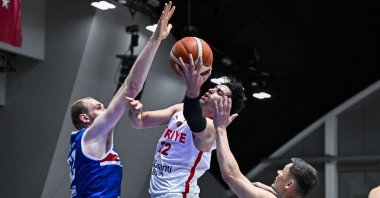 Türkiye’s Furkan Korkmaz (C) battles for the ball with Iceland’s Elvar Fridriksson (R) during their FIBA 2027 Basketball World Cup European Qualifiers second-round Group J game, Reykjavik, Iceland, Sept. 1, 2026. (AA Photo)