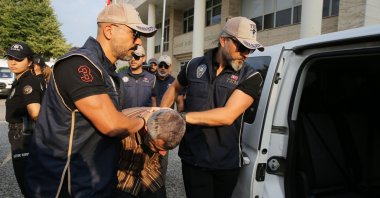 FETÖ member Burkay Karatepe, who was wanted for his involvement in the assassination attempt targeting President Recep Tayyip Erdoğan during the July 15, 2016 coup attempt, is detained, Muğla, Türkiye, Aug. 8, 2026. (AA Photo)