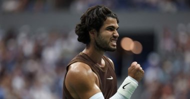 Carlos Alcaraz reacts against Roman Safiullin during their Men's Singles first-round match on Day Two of the 2026 US Open at USTA Billie Jean King National Tennis Center in the Flushing neighborhood of the Borough of Queens, New York City, Aug. 31, 2026. (AFP Photo)