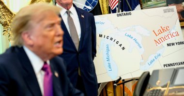 U.S. President Donald Trump speaks next to a map with "Lake America" written on it as he attends an event to sign an executive order renaming Lake Ontario as Lake America at the Oval Office of the White House, Washington, D.C., U.S., Aug. 27, 2026. (Reuters Photo)