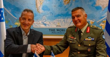 The director general of the Israel Ministry of Defense, Amir Baram, and his Greek counterpart, Ioannis Bouras, shake hands as they sign the deal, Tel Aviv, Israel, Aug. 31, 2026. (Reuters Photo)