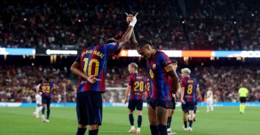 Barcelona's Lamine Yamal (L) celebrates scoring their second goal with Raphinha during the La Liga match against Rayo Vallecano at Spotify Camp Nou, Barcelona, Spain, Aug. 31, 2026. (Reuters Photo)