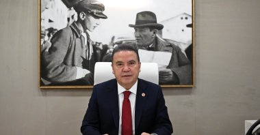 This undated photo shows former Antalya mayor Muhittin Böcek in his office, Antalya, southern Türkiye. (DHA Photo)