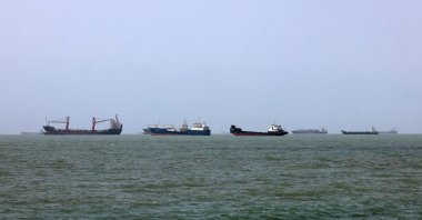 Vessels transit the Strait of Hormuz off Bandar Abbas in southern Iran, Aug. 10, 2026. (AFP File Photo)