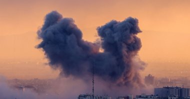 A plume of smoke rises after a strike on the Iranian capital Tehran, March 3, 2026. (AFP File Photo)