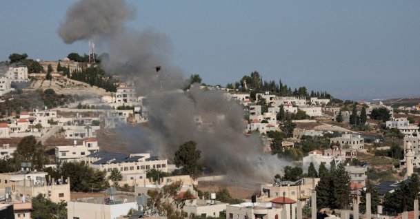 Smoke rises as Israeli forces blow up the house of a Palestinian family near Nablus, in the Israeli-occupied West Bank, Aug. 11, 2026. (Reuters File Photo)