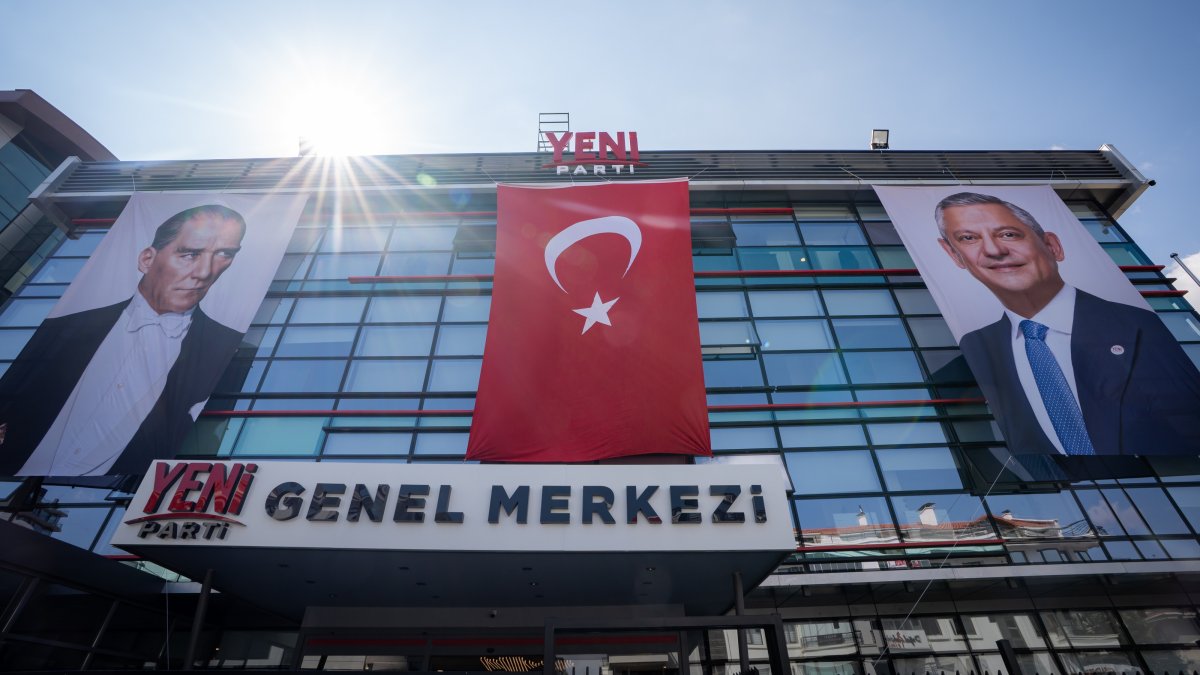 A view of the headquarters of the newly founded New Party (YP), featuring images of Türkiye's founding leader Mustafa Kemal Atatürk (L) and party chairperson Özgür Özel, along with the Turkish flag, Ankara, Türkiye, Aug. 31, 2026. (AA Photo)