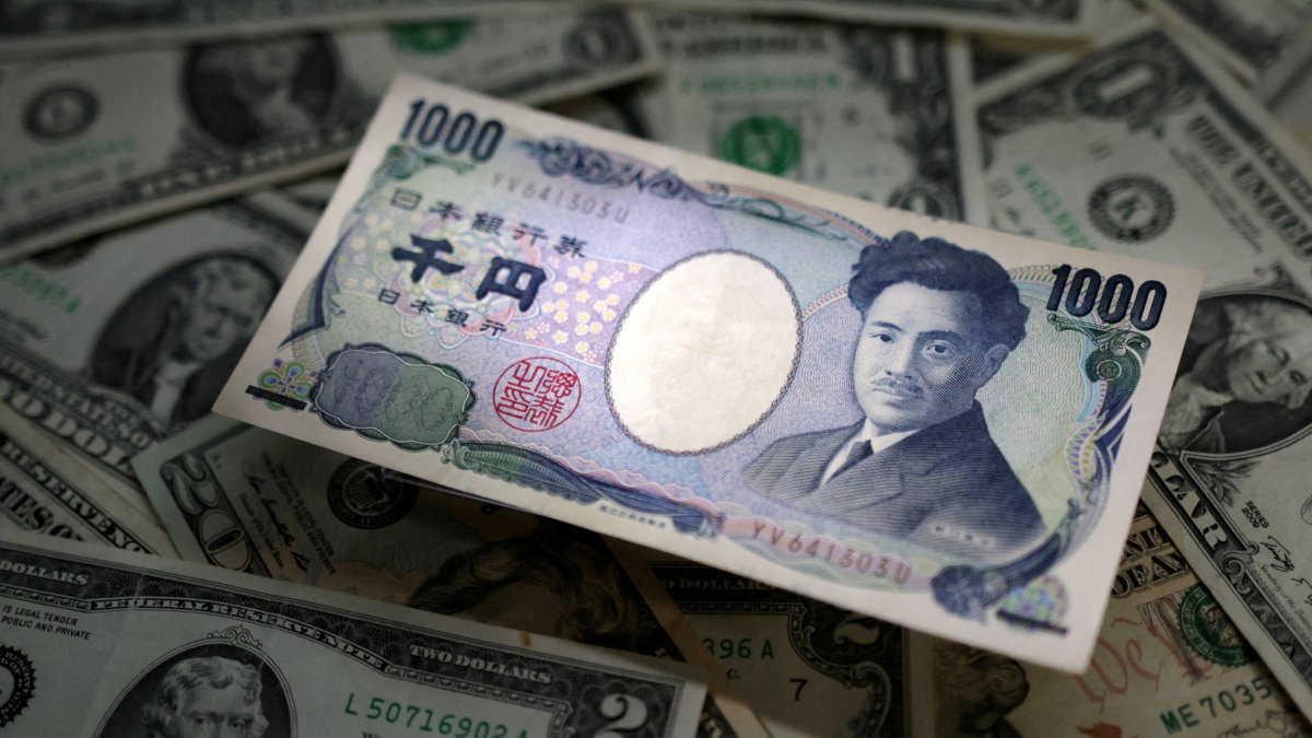Japanese yen and U.S. dollar banknotes are seen in this illustration created on March 10, 2023. (Reuters Photo)