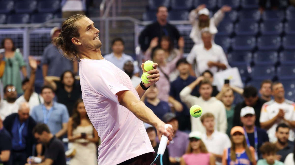 Germany's Alexander Zverev tosses tennis balls towards the spectators after winning his U.S. Open first-round match against Italy's Lorenzo Sonego at Flushing Meadows, New York, U.S., Sept. 2, 2026. (Reuters Photo)