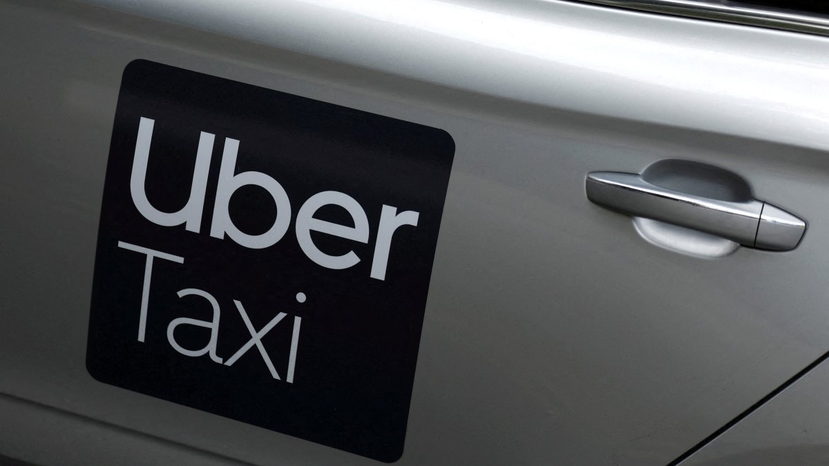 The Uber logo is seen on the side of a taxi, in Dublin, Ireland, June 29, 2025. (Reuters Photo)