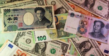 U.S. dollar, euro, yen, pound, Turkish lira, yuan banknotes are seen in this illustration taken March 24, 2026. (Reuters Photo)