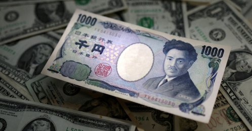 Japanese yen and U.S. dollar banknotes are seen in this illustration created on March 10, 2023. (Reuters Photo)