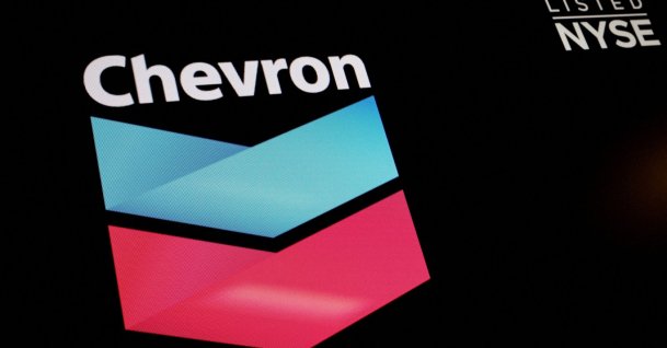 The logo and trading information for Chevron are displayed on a screen on the floor of the New York Stock Exchange (NYSE), New York City, U.S., June 27, 2022. (Reuters Photo)