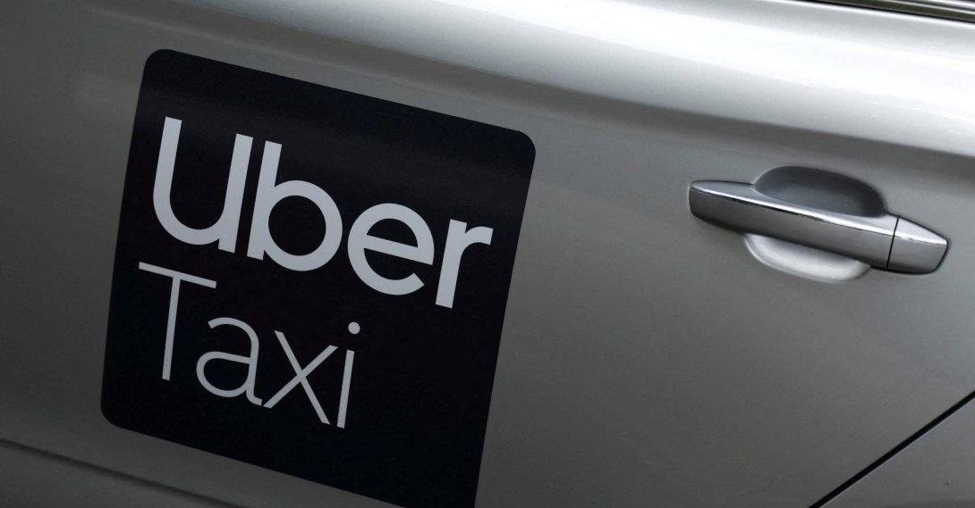 The Uber logo is seen on the side of a taxi, in Dublin, Ireland, June 29, 2025. (Reuters Photo)